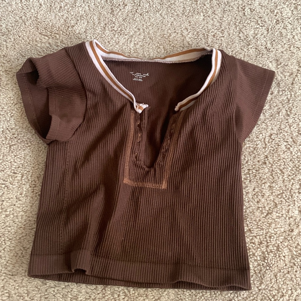 Urban Outfitters brown out from under top.